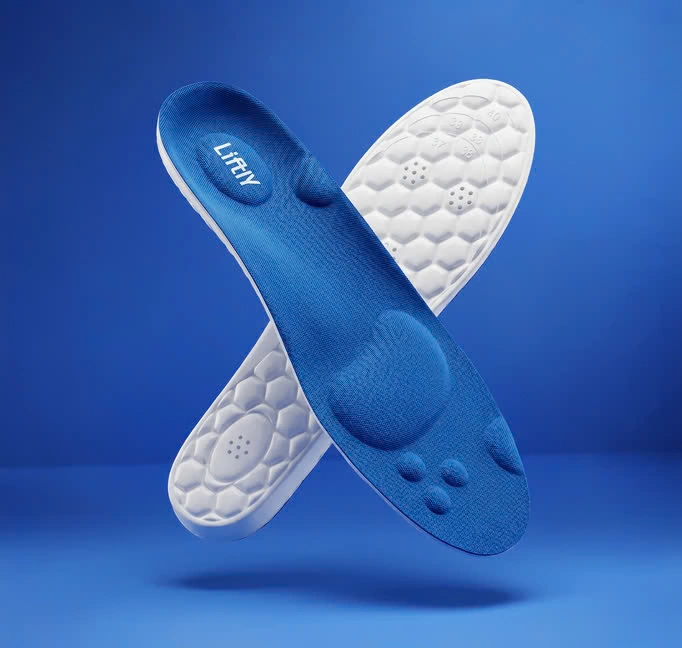 Pair of Liftly insoles crossed, showing the blue top and white cushioned base