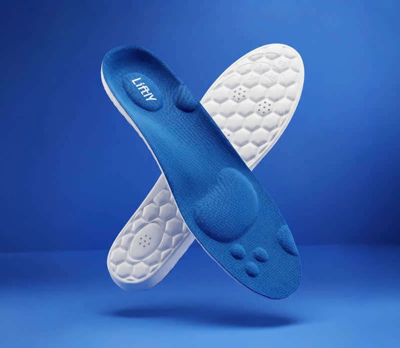 Liftly insoles showing the arch support, massage nodes and hexagon cushioning underside